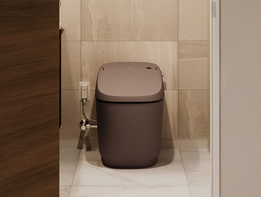 上質な素材感で設えた高級感のあるウォームグレーの壁床に、品よく際立つノーブルトープのトイレとのコーディネート。